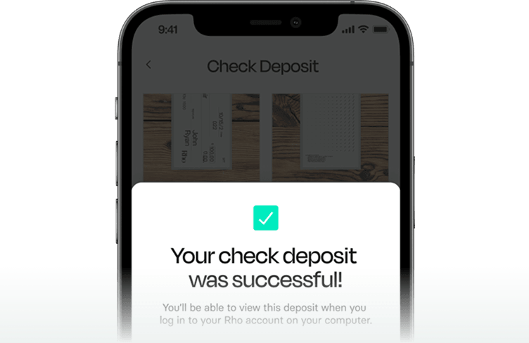A smartphone screen displays a confirmation message: "Your check deposit was successful!" with check images in the background.
